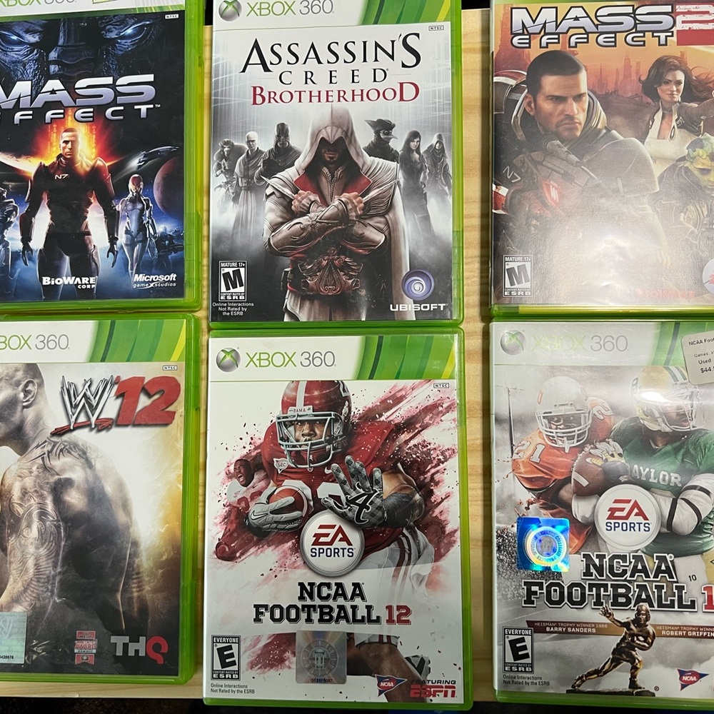 Green and White Xbox 360 Video Games Collection